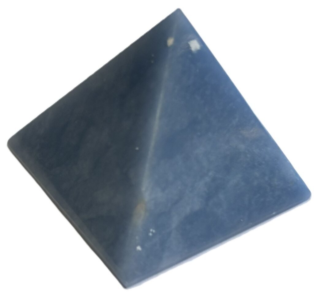 Polished blue angelite four sided pyramid showing natural white veining and earthy inclusions on a white background